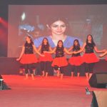 Students performing group dance