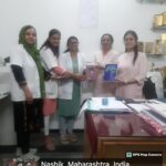 Photo 2: Dr. Sakina, Dr. Monal, Dr. Pranita handing over the books to Dr. Preeti Bajaj and Dr. Devangana Rajyaguru